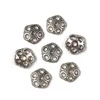 Charm, ornament metalic, 7 buc - capace cu 5 dinti, 8 mm